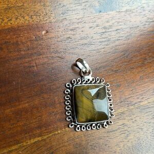 Tiger Eye Silver Plated Pendant with hearts inside